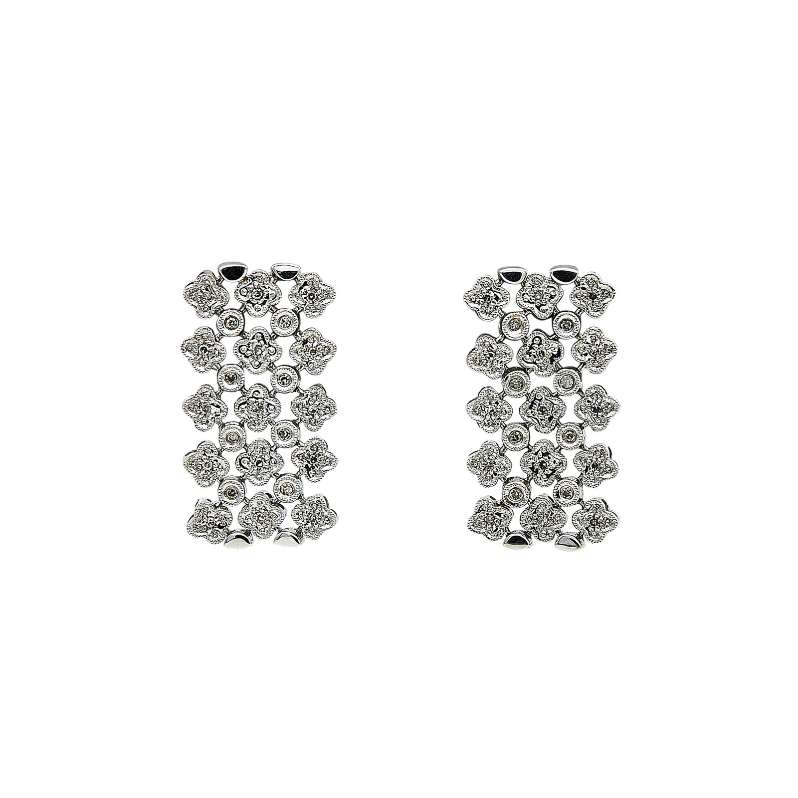18K White Gold and Diamond Earrings: METAL: 18K White Gold; APPROXIMATE TOTAL DIAMOND WEIGHT: 0.20 ctw; STAMPED: 750; CONDITION: Pre-owned, Very Good; ITEM WEIGHT (GRAMS): 9.8 g; MEASUREMENTS: Earrings approx. 1 1/16 inch long x 5/8