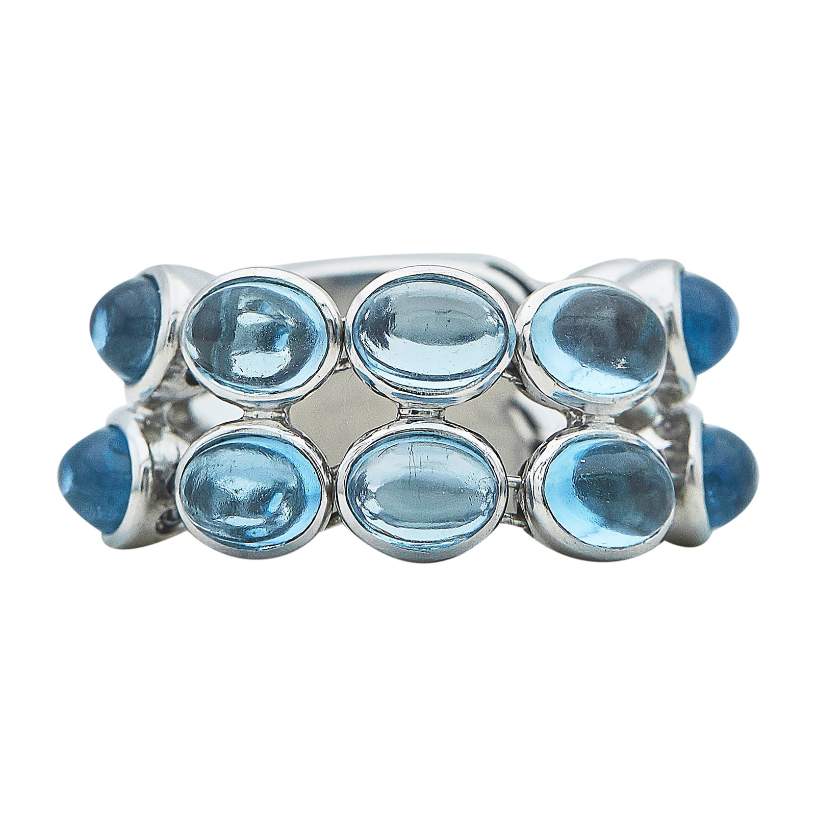 18K White Gold and Blue Topaz Flexible Ring: METAL: 18K White Gold; GEMSTONES: Blue Topaz; STAMPED: 750; CONDITION: Pre-owned, Very Good; ITEM WEIGHT (GRAMS): 11.7 g; MEASUREMENTS: Ring size 8