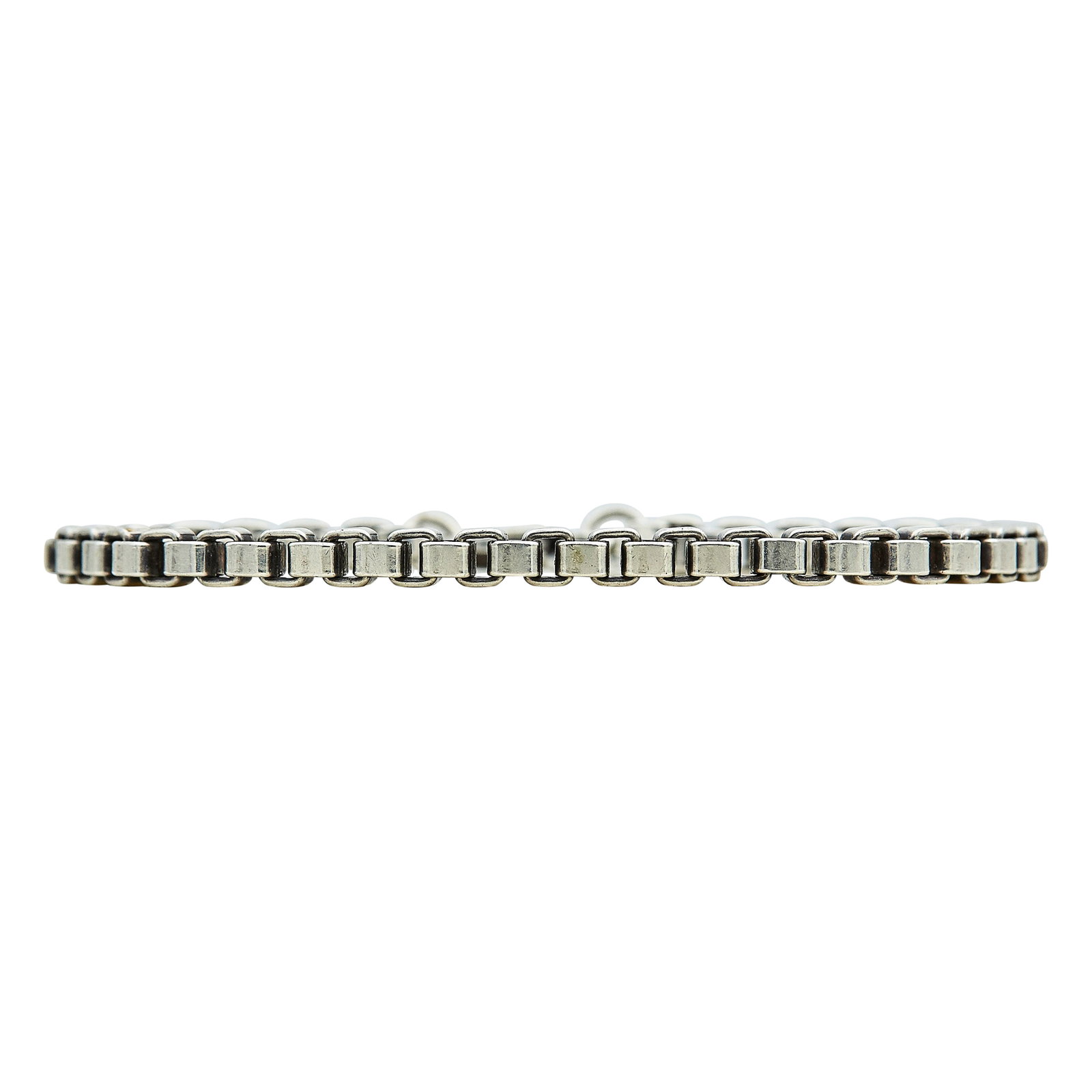 Tiffany & Co. Sterling Silver Box Chain Bracelet: BRAND: Tiffany & Co.; METAL: Sterling Silver; STAMPED: © Tiffany & Co., 925; CONDITION: Pre-owned, Good; ITEM WEIGHT (GRAMS): 13.3 g; MEASUREMENTS: Bracelet 6 3/4 inches long
