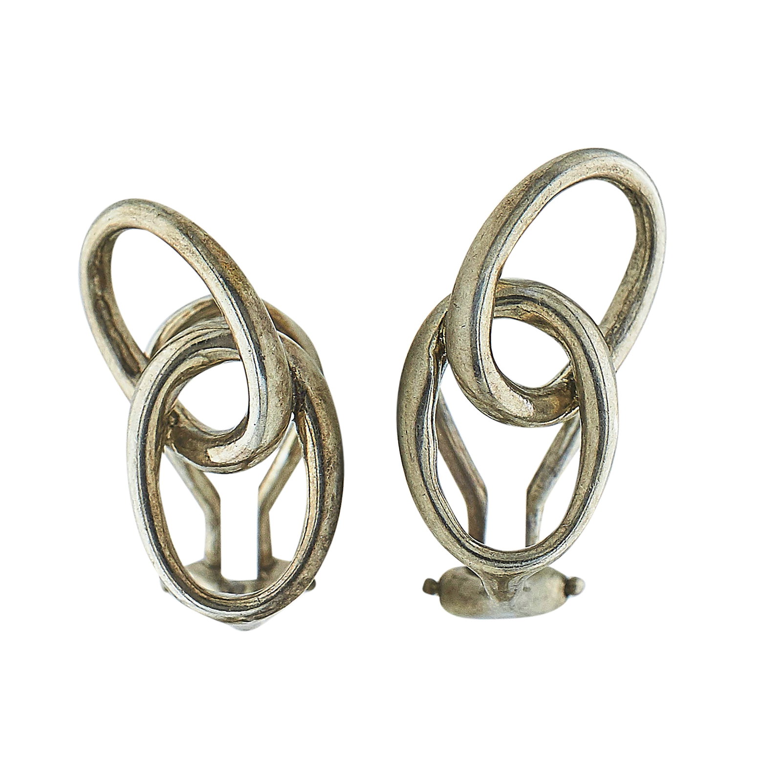 Tiffany & Co. Peretti Sterling Silver Interlocking Ring Earrings: BRAND: Tiffany & Co.; COLLECTION: Peretti; METAL: Sterling Silver; STAMPED: Peretti, 925, © Tiffany & Co.; CONDITION: Pre-owned, Good; ITEM WEIGHT (GRAMS): 5.1 g; MEASUREMENTS: Earrings 3/4 inch long