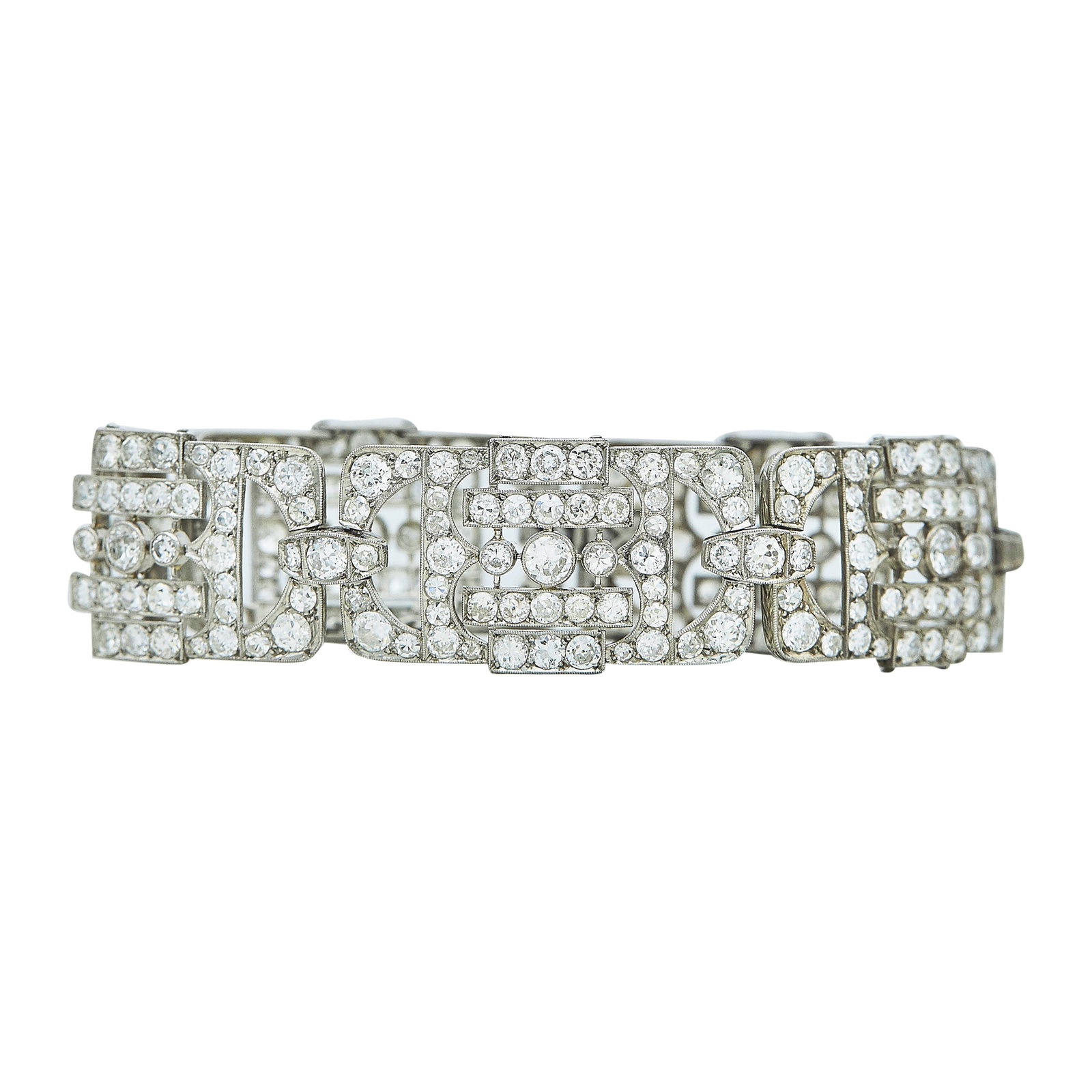 Art Deco Platinum and Diamond Bracelet: METAL: Platinum; APPROXIMATE TOTAL DIAMOND WEIGHT: 13 ctw; TESTED: Platinum; CONDITION: Pre-owned, Very Good; ITEM WEIGHT (GRAMS): 38.2 g; MEASUREMENTS: Bracelet approx. 7 inches long x 3/4 inch wide;