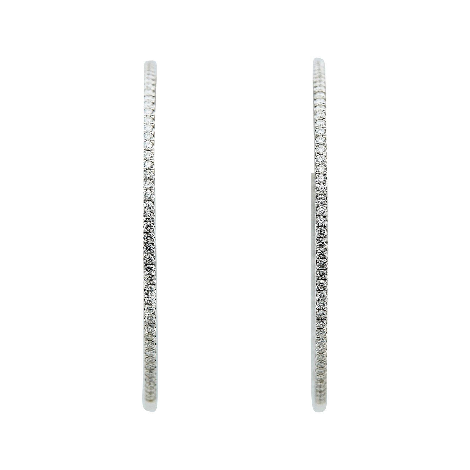 18K White Gold and Diamond Inside-Out Hoop Earrings: METAL: 18K White Gold; APPROXIMATE TOTAL DIAMOND WEIGHT: 2.85 ctw; TESTED: 18K White Gold; CONDITION: Pre-owned, Very Good; ITEM WEIGHT (GRAMS): 11.1 g; MEASUREMENTS: Earrings approx. 1 15/16 inch in 