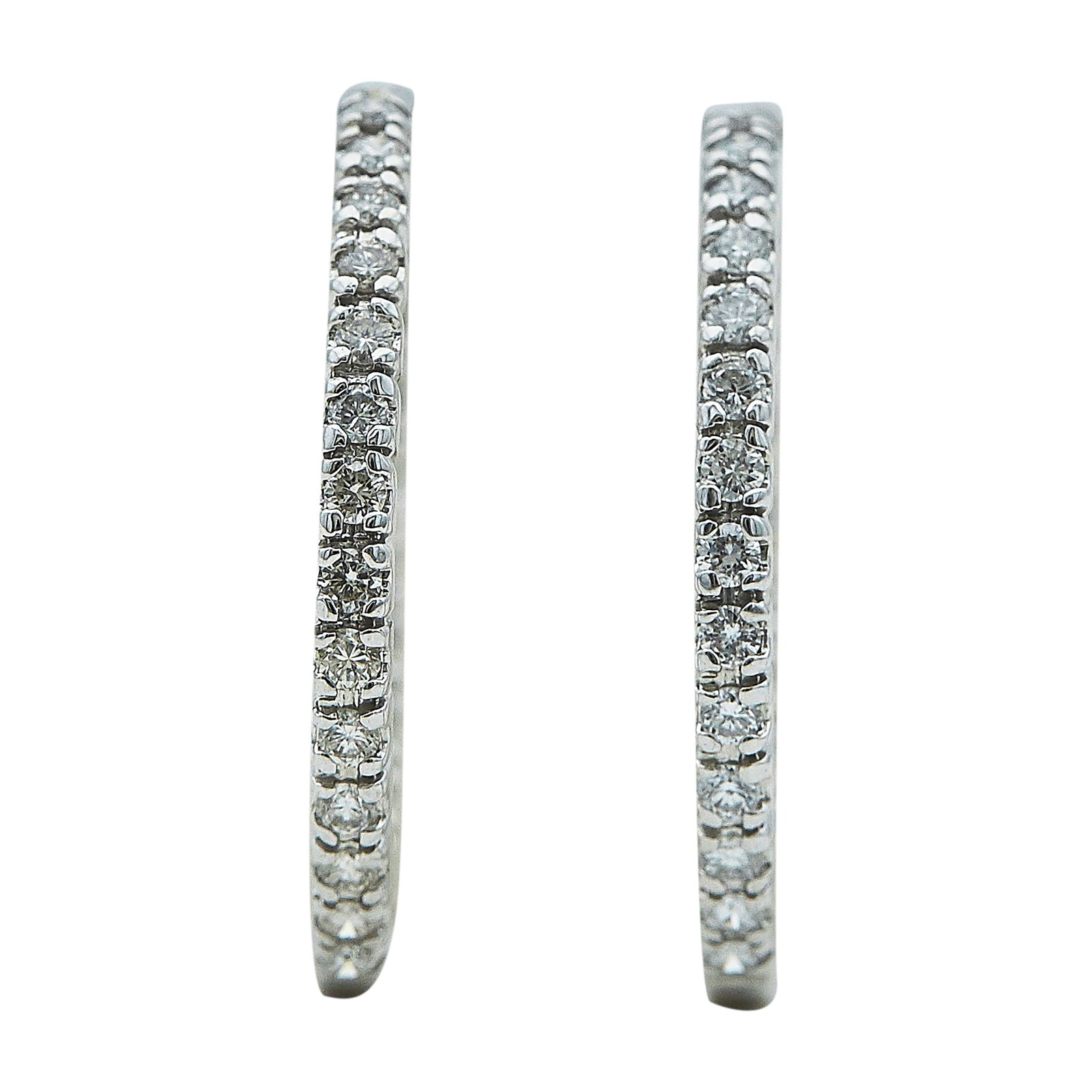 14K White Gold and Diamond Inside Out Hoop Earrings: METAL: 14K White Gold; APPROXIMATE TOTAL DIAMOND WEIGHT: 2.24 ctw; STAMPED: KCD, 14K; CONDITION: Pre-owned, Very Good; ITEM WEIGHT (GRAMS): 7.4 g; MEASUREMENTS: Earrings 1 3/16 inch in diameter; ADDIT