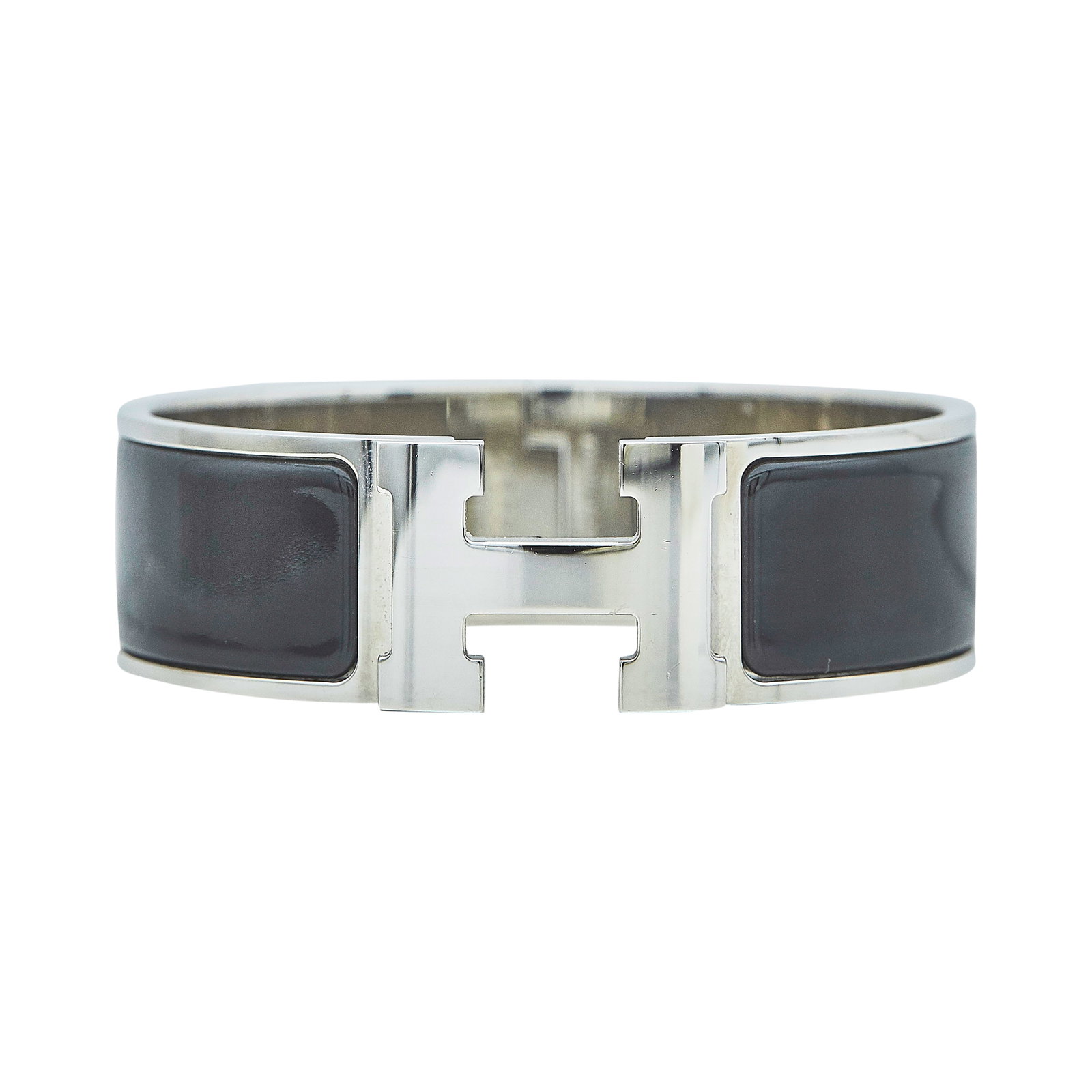 Hermès Clic H Base Metal and Black Enamel Bracelet: BRAND: Hermès; COLLECTION: Clic H; METAL: Base Metal; STAMPED: Hermès, ST, number, MADE IN FRANCE; CONDITION: Pre-owned, Good; ITEM WEIGHT (GRAMS): 69 g; MEASUREMENTS: Bracelet interior circumferenc