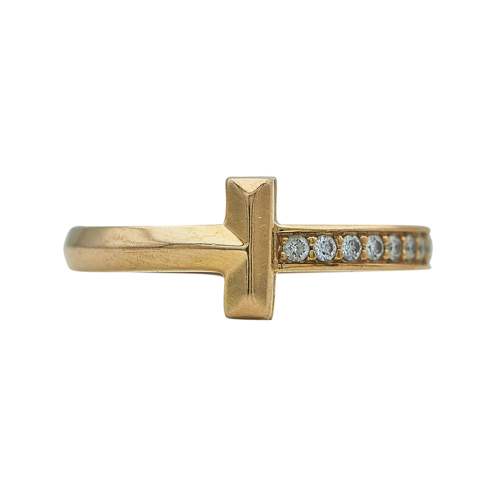 Tiffany & Co. Tiffany T T1 18K Yellow Gold and Diamond Ring: BRAND: Tiffany & Co.; COLLECTION: Tiffany T; METAL: 18K Yellow Gold; APPROXIMATE TOTAL DIAMOND WEIGHT: 0.08 ctw; STAMPED: © T & Co. Au750, ITALY, d0.08ct; CONDITION: Pre-owned, Good; ITEM WEIGHT (GRA