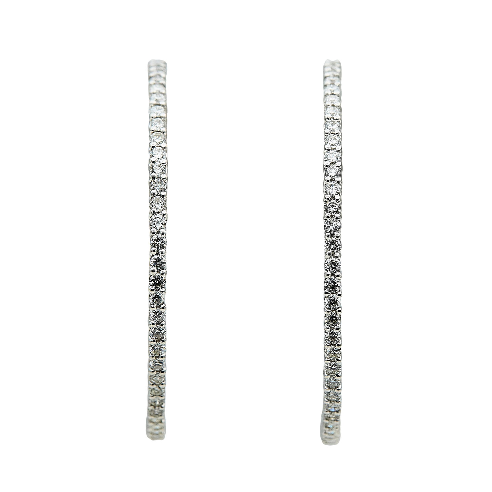 18K White Gold and Diamond Inside-Out Hoop Earrings: METAL: 18K White Gold; APPROXIMATE TOTAL DIAMOND WEIGHT: 2.40 ctw; STAMPED: Undefined marks; TESTED: 18K White Gold; CONDITION: Pre-owned, Very Good; ITEM WEIGHT (GRAMS): 10.5 g; MEASUREMENTS: Earring