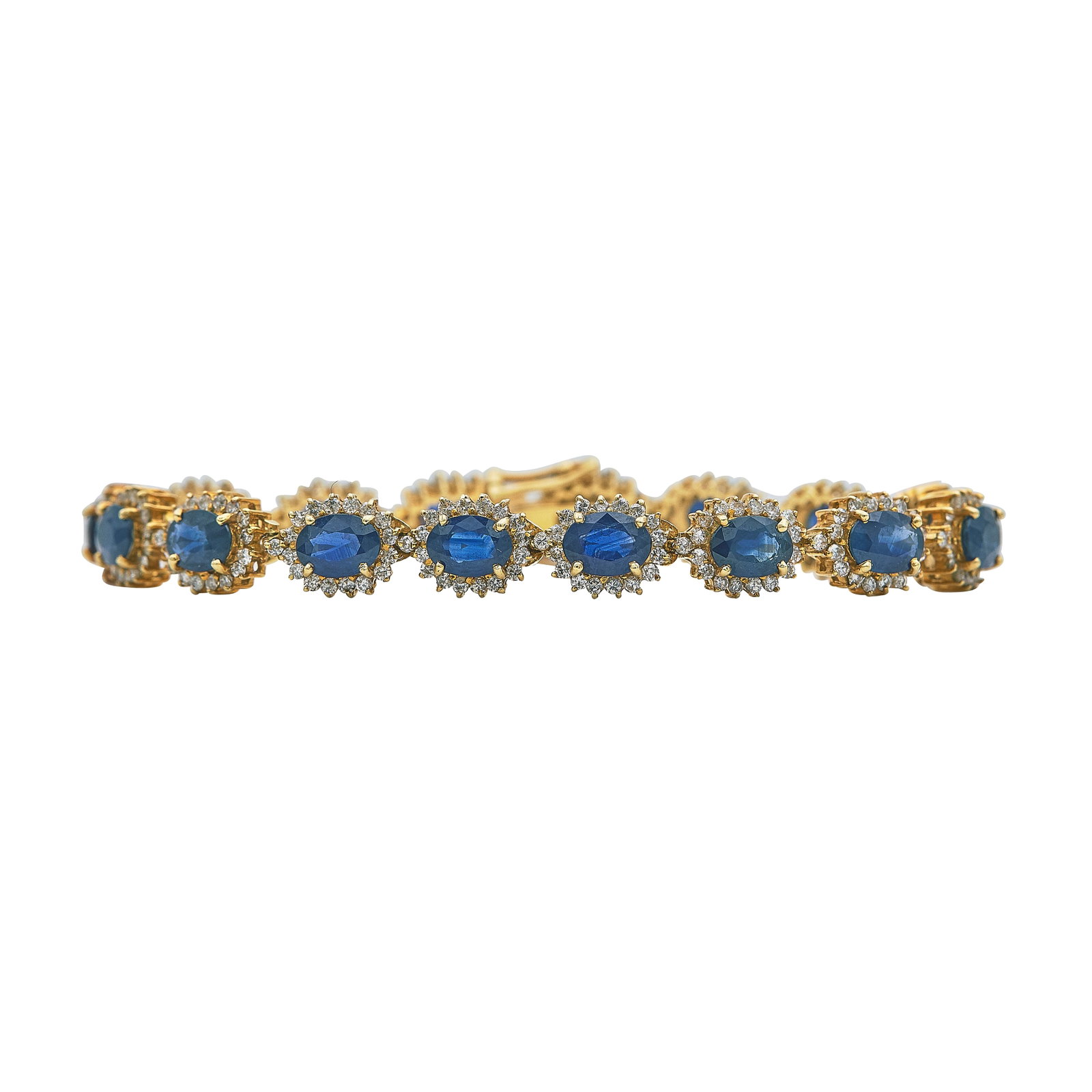 18K Yellow Gold Sapphire and Diamond Link Bracelet: METAL: 18K Yellow Gold; APPROXIMATE TOTAL DIAMOND WEIGHT: 2.45 ctw; GEMSTONES: Sapphire approx. 24.8 carats total weight, Weight estimated by formula; STAMPED: 18K, MAG; CONDITION: Pre-owned, Very