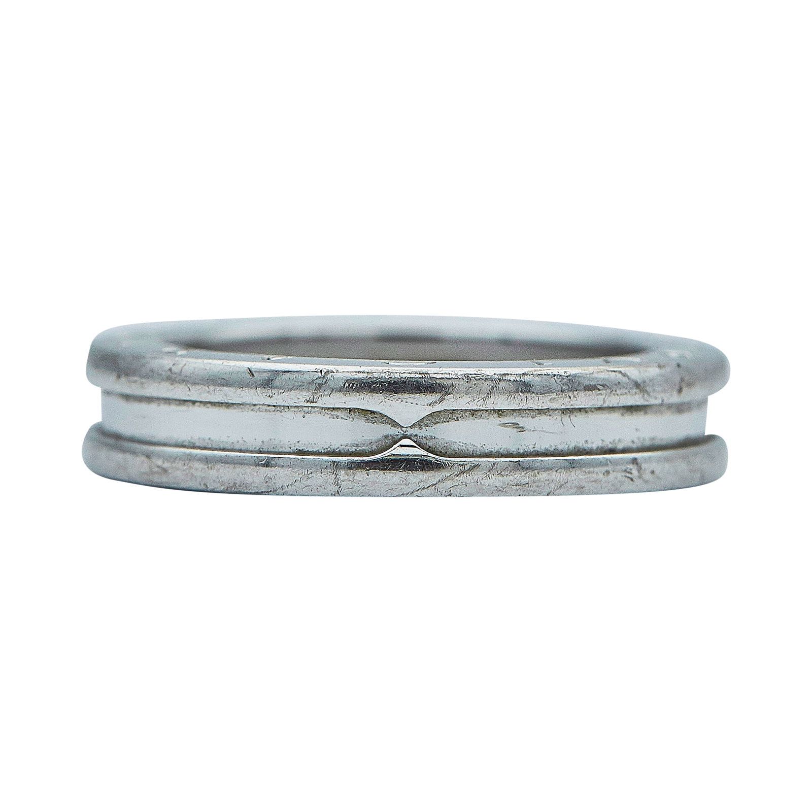 Bulgari Bvlgari B.zero1 One-Band 18K White Gold Band Ring: BRAND: Bulgari; COLLECTION: B.zero1; METAL: 18K White Gold; STAMPED: 54, Au750, Italian Workshop Mark, Made in Italy; CONDITION: Pre-owned, Very Good; ITEM WEIGHT (GRAMS): 8.1 g; MEASUREMENTS: Bvlgari