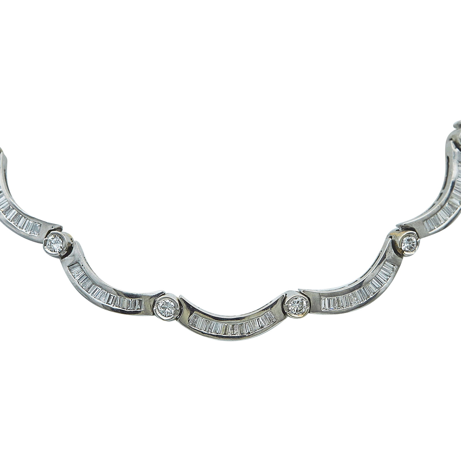 14K White Gold and Diamond Scalloped Collar Necklace: METAL: 14K White Gold; APPROXIMATE TOTAL DIAMOND WEIGHT: 9 ctw; TESTED: 14K White Gold; CONDITION: Pre-owned, Good; ITEM WEIGHT (GRAMS): 43.5 g; MEASUREMENTS: Necklace approx. 17 inches long x 1/8