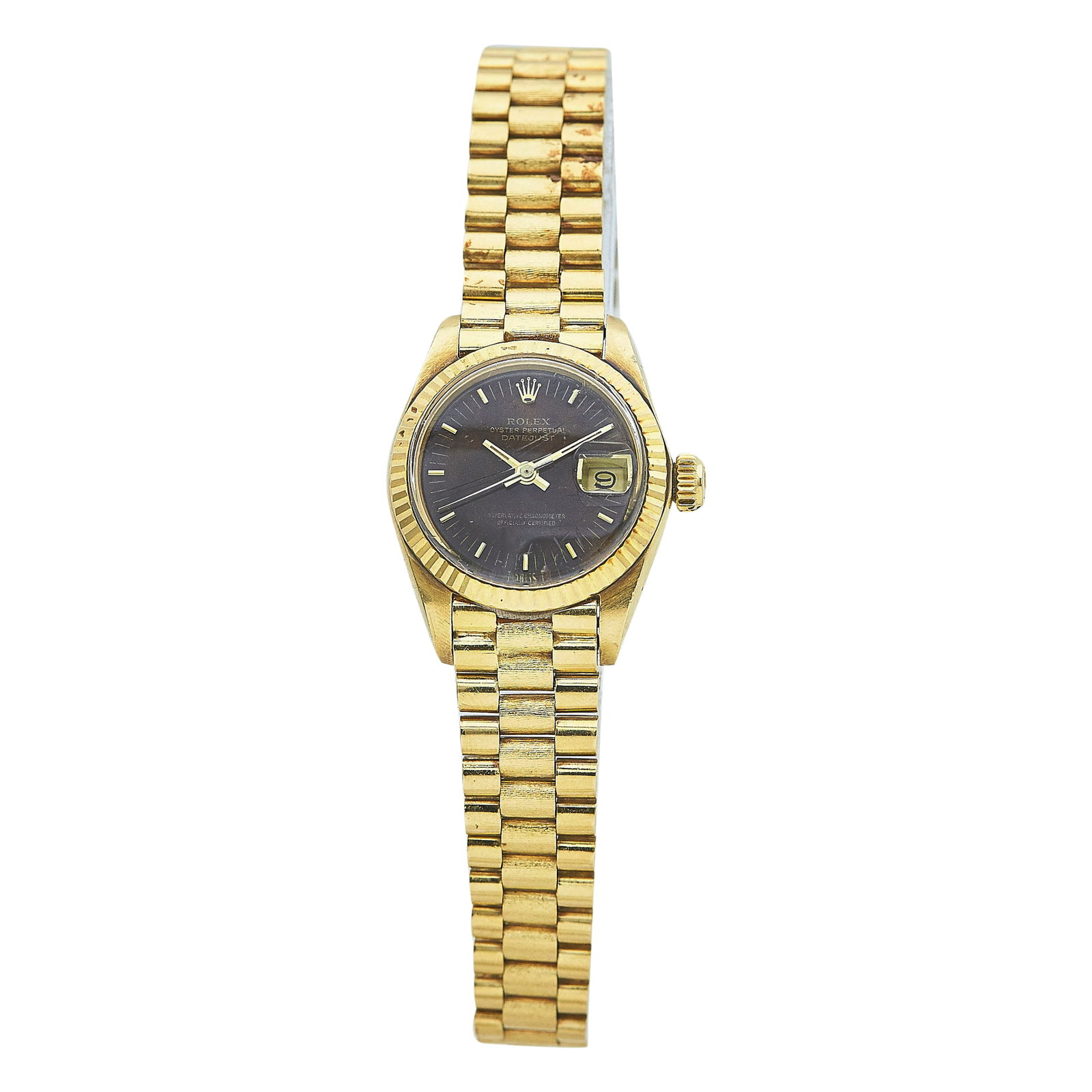 Rolex Datejust 18K Yellow Gold Watch Ref. 6917, circa 1979: BRAND: Rolex; STYLE: Datejust; REF. #: 6917; CONDITION: Pre-owned, Good; YEAR: Circa 1979; ADDITIONAL COMMENTS: 5.9 mil serial, Scratches throughout watch, Scratches throughout acrylic crystal, Bracel
