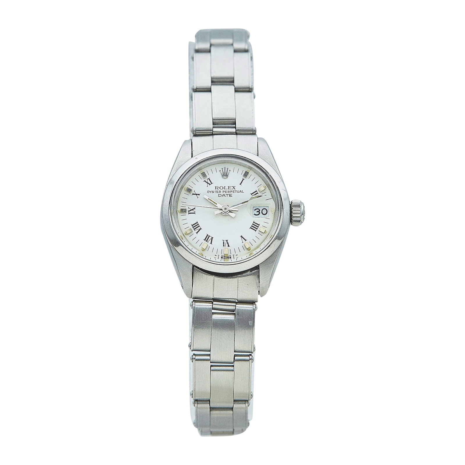 Rolex Date Stainless Steel Watch Ref. 6916, circa 1981: BRAND: Rolex; STYLE: Date; REF. #: 6916; CONDITION: Pre-owned, Good; YEAR: Circa 1981; ADDITIONAL COMMENTS: 7 mil serial, Scratches throughout watch, Scratches on acrylic crystal, Bracelet with modera