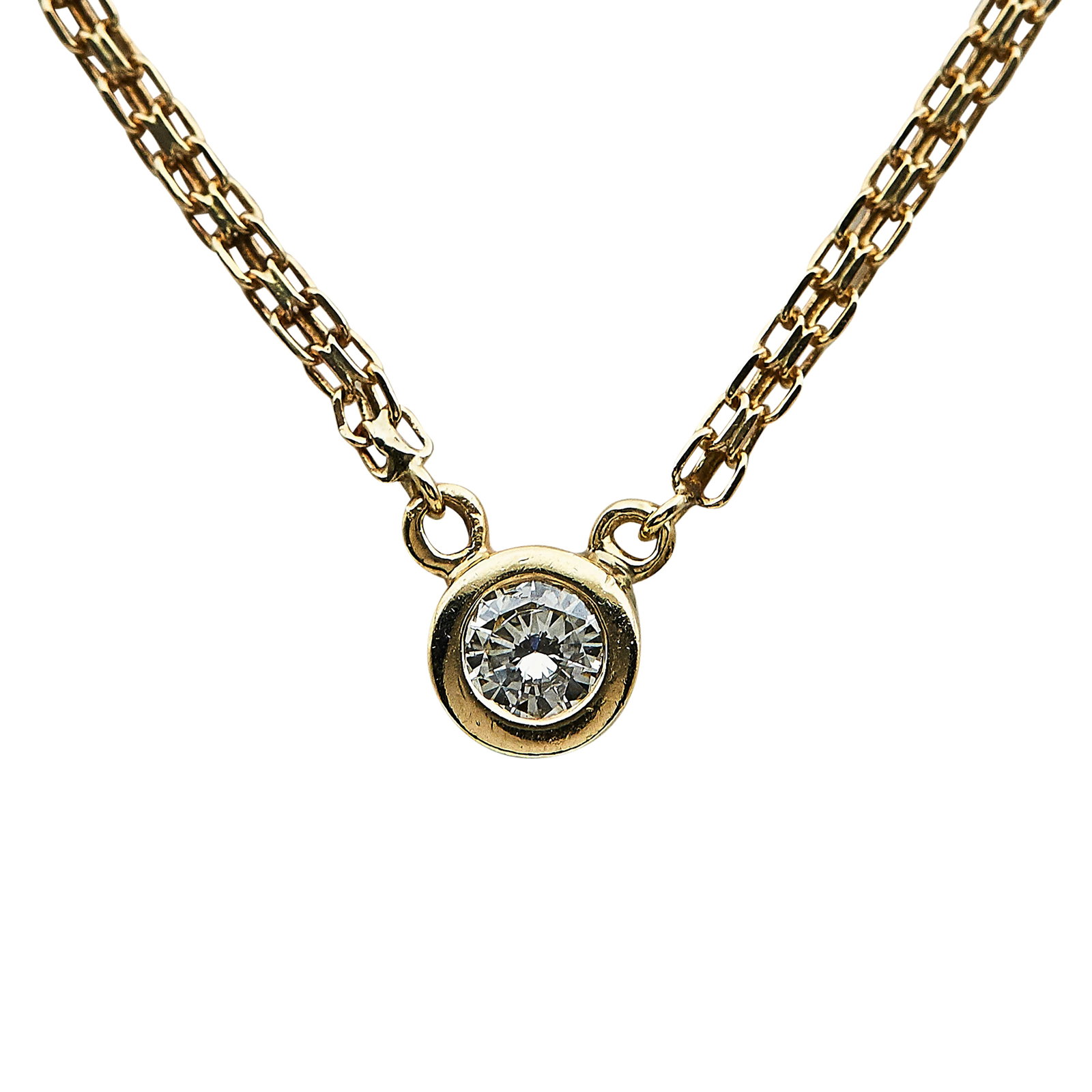 14K Yellow Gold and Diamond Bezel Set Solitaire Necklace: METAL: 14K Yellow Gold; APPROXIMATE TOTAL DIAMOND WEIGHT: 0.99 ctw; STAMPED: 14K, RW; CONDITION: Pre-owned, Very Good; ITEM WEIGHT (GRAMS): 4.1 g; MEASUREMENTS: Necklace 16 inches including pendant, P
