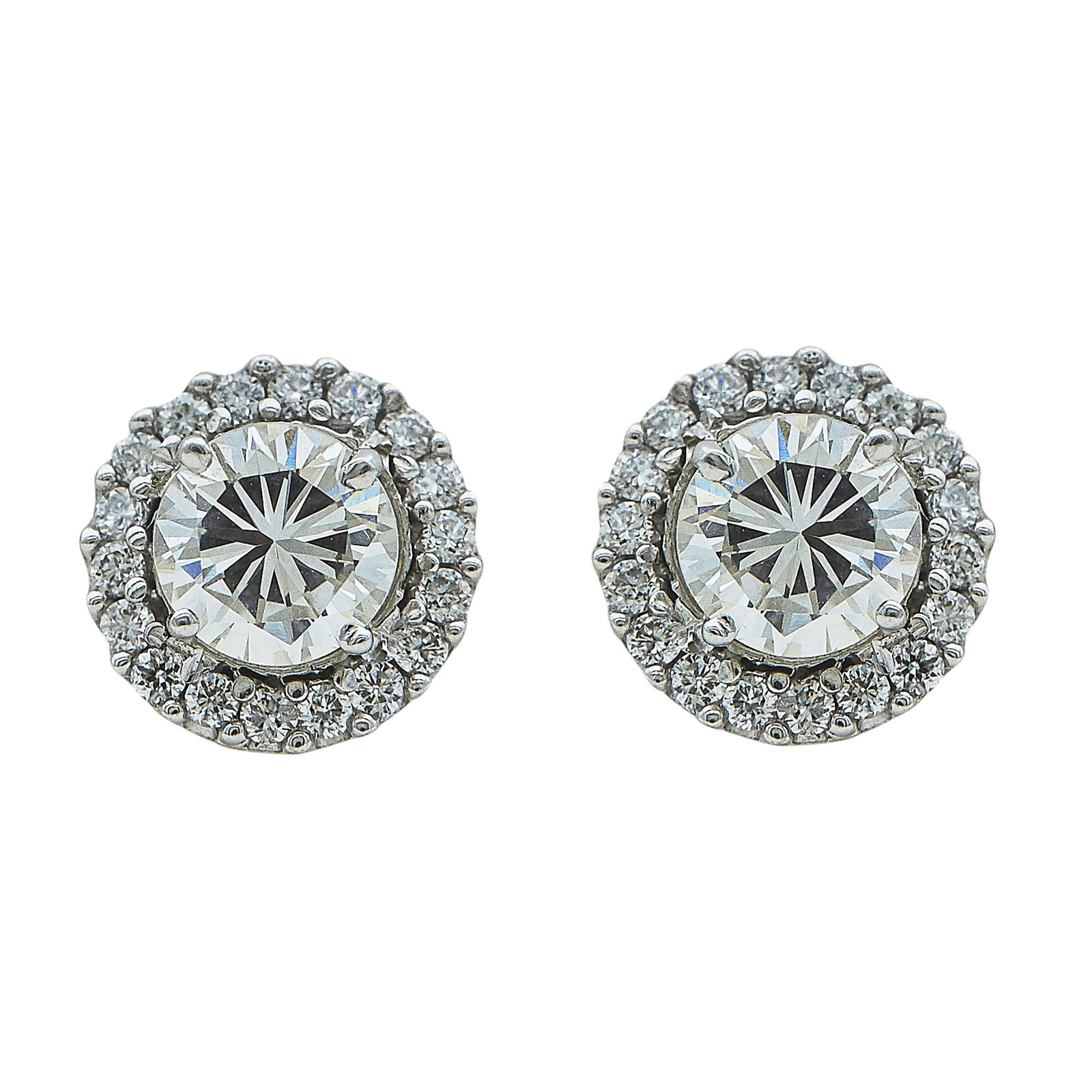 14K White Gold and Diamond Stud with Jacket Earrings: METAL: 14K White Gold; APPROXIMATE TOTAL DIAMOND WEIGHT: 1.50 ctw; STAMPED: 14K, Maker's marks; CONDITION: Pre-owned, Good; ITEM WEIGHT (GRAMS): 2.2 g; MEASUREMENTS: Earrings approx. 5/16 inch in diam