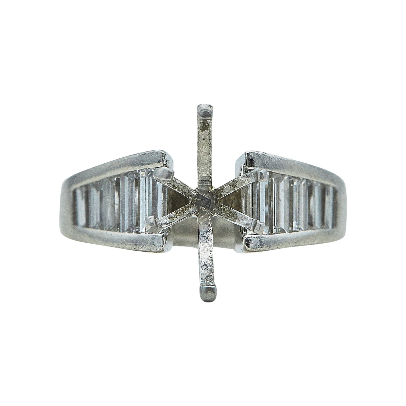 Platinum and Diamond Marquise Ring Setting: METAL: Platinum; APPROXIMATE TOTAL DIAMOND WEIGHT: 1.20 ctw; STAMPED: PLAT, TR; CONDITION: Pre-owned, Good; ITEM WEIGHT (GRAMS): 11.7 g; MEASUREMENTS: Ring size 6, Center will fit approx. 11.90 mm x 6