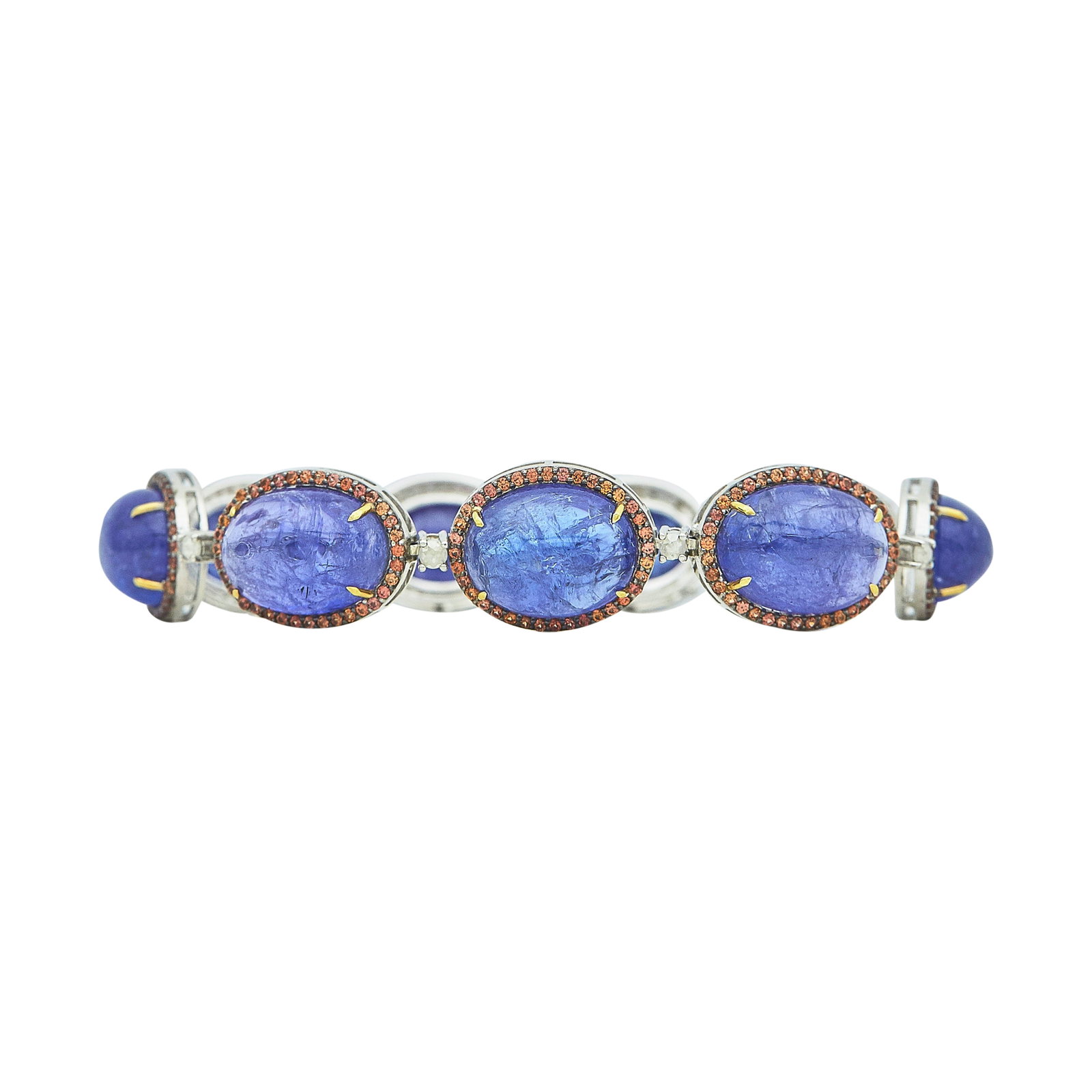 Silver, Tanzanite, Orange Sapphire, and Diamond Link Bracelet: METAL: Silver; GEMSTONES: Tanzanite and Orange Sapphire; TESTED: Silver; CONDITION: Pre-owned, Good; ITEM WEIGHT (GRAMS): 34.1 g; MEASUREMENTS: Bracelet approx. 7 3/8 inches long x 5/8 inch wide, Rose