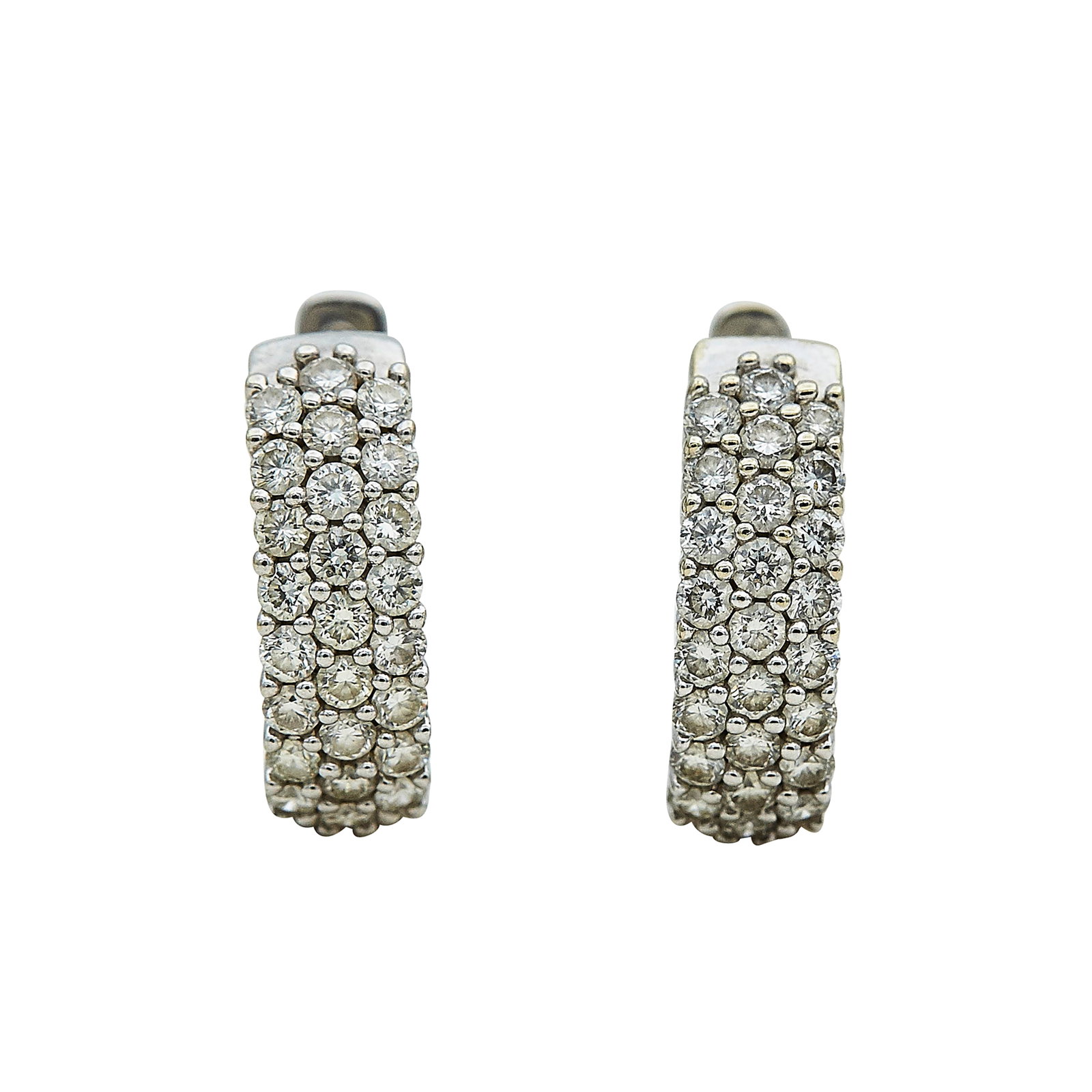 14K White Gold and Diamond Huggie Earrings: METAL: 14K White Gold; APPROXIMATE TOTAL DIAMOND WEIGHT: 1 ctw; STAMPED: 14K, UD; CONDITION: Pre-owned, Very Good; ITEM WEIGHT (GRAMS): 5.9 g; MEASUREMENTS: Earrings approx. 9/16 inch in diameter; ADD