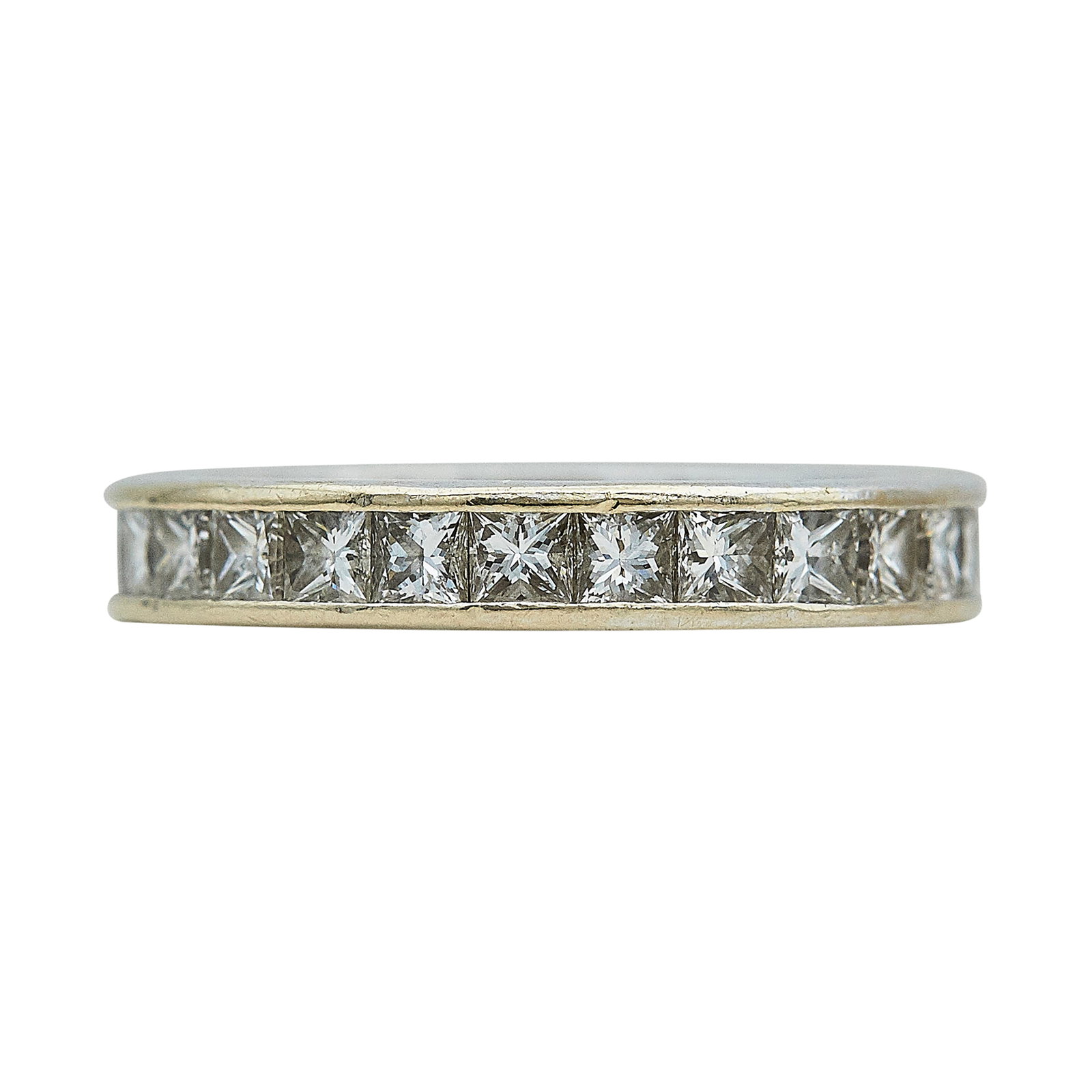 14K White Gold and Princess Cut Diamond Eternity Band Ring: METAL: 14K White Gold; APPROXIMATE TOTAL DIAMOND WEIGHT: 2.60 ctw; STAMPED: Maker's mark, 14K, Serial number; CONDITION: Pre-owned, Very Good; ITEM WEIGHT (GRAMS): 3.2 g; MEASUREMENTS: Ring size 5 1/4