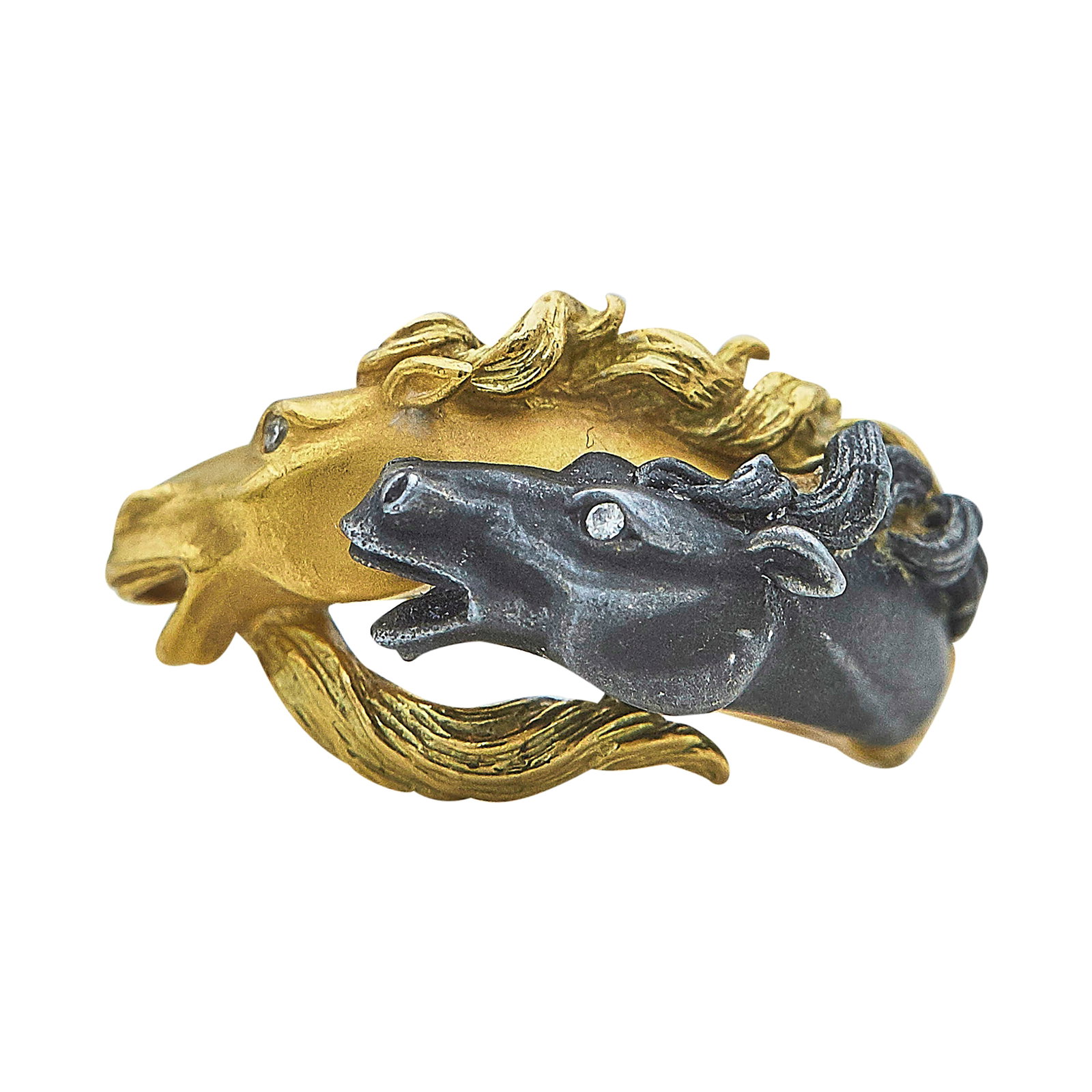 Carrera Y Carrera 18K Yellow Gold and Stainless Steel Horse Head Ring: BRAND: Carrera Y Carrera; METAL: 18K Yellow Gold/Stainless Steel; APPROXIMATE TOTAL DIAMOND WEIGHT: 0.01 ctw; STAMPED: Maker's mark, 750; CONDITION: Pre-owned, Very Good; ITEM WEIGHT (GRAMS): 6.9 g; M
