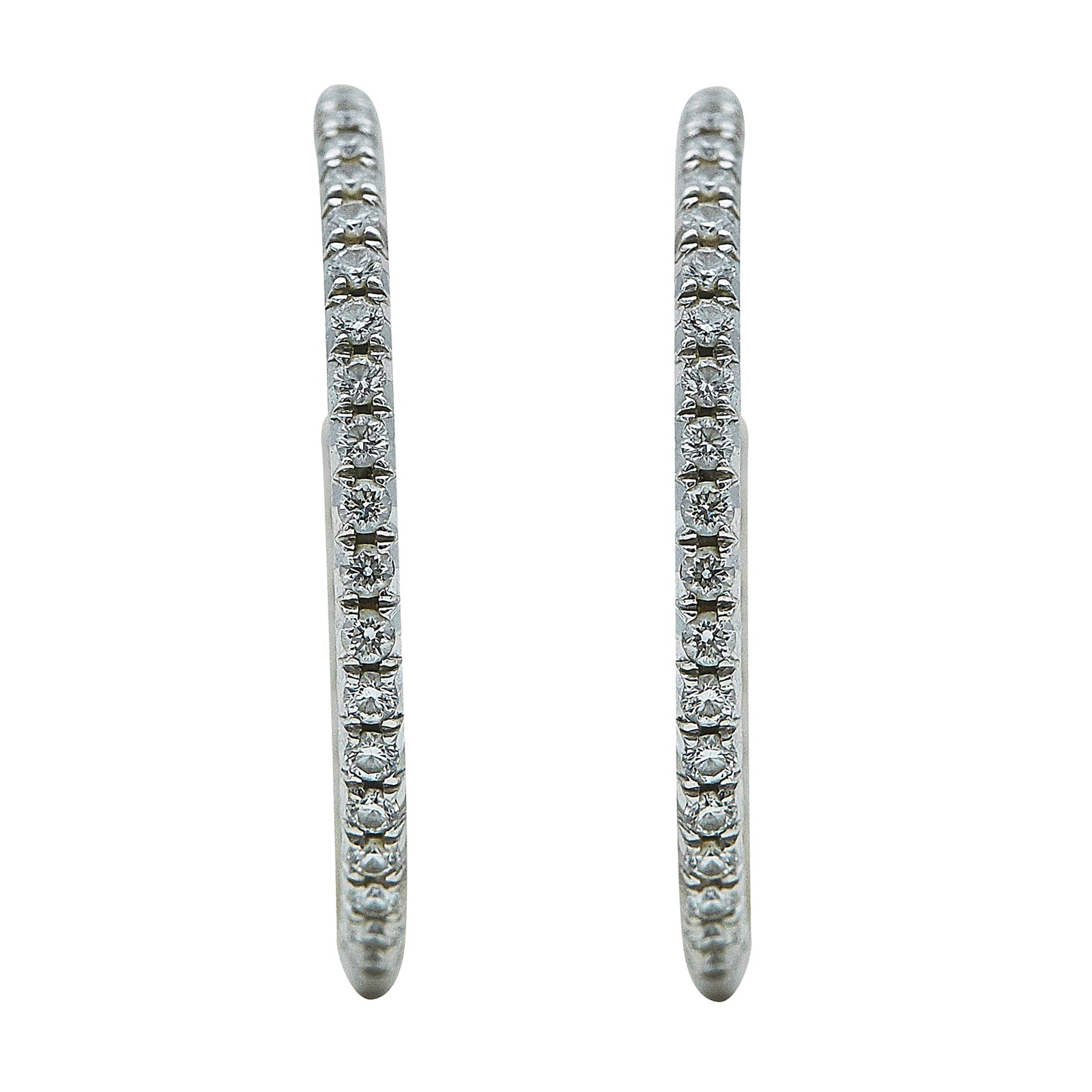 Tiffany & Co. Metro 18K White Gold and Diamond Inside-Out Hoop Earrings: BRAND: Tiffany & Co.; COLLECTION: Metro; METAL: 18K White Gold; APPROXIMATE TOTAL DIAMOND WEIGHT: 0.62 ctw; STAMPED: Backs marked: © Tiffany & Co., Au750, Numbered; Earrings marked: © Tiffany & Co.,