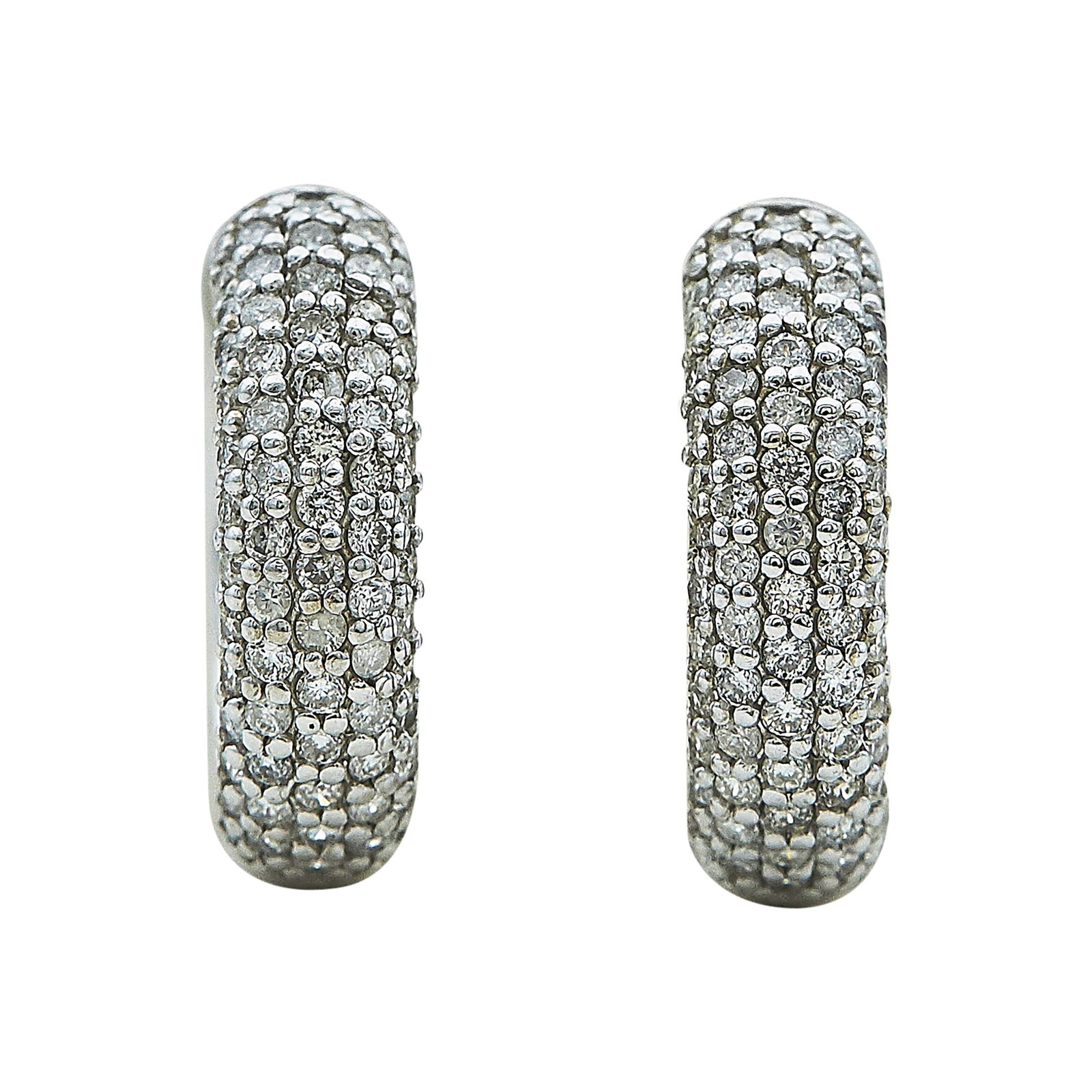14K White Gold and Diamond Huggie Earrings: METAL: 14K White Gold; APPROXIMATE TOTAL DIAMOND WEIGHT: 1.30 ctw; STAMPED: 14K; CONDITION: Pre-owned, Good; ITEM WEIGHT (GRAMS): 6.63 g; MEASUREMENTS: Earrings 11/16 inch long x 1/4 inch wide; ADDITI