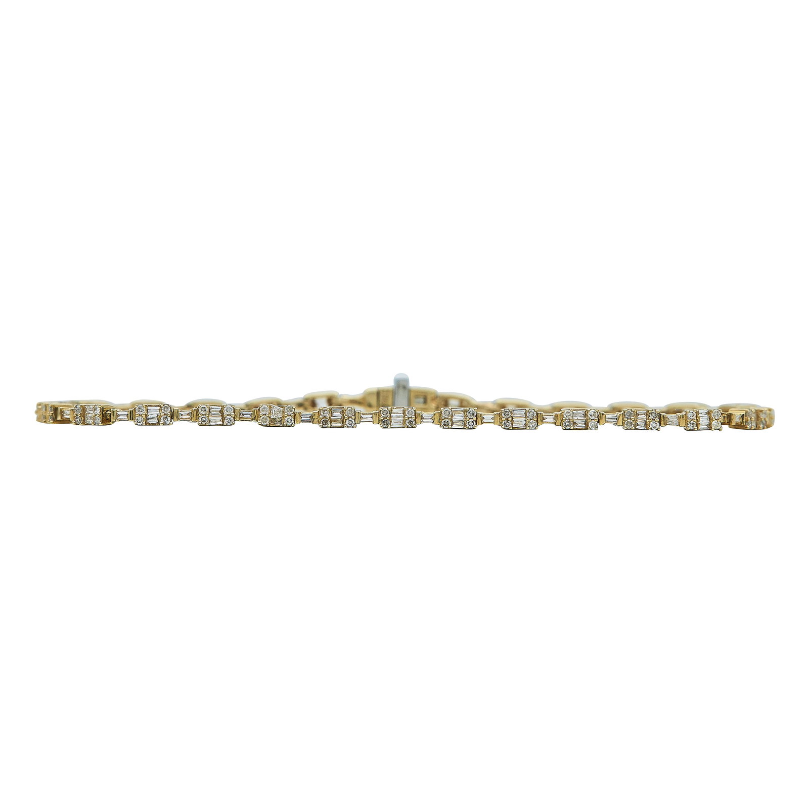 14K Yellow Gold and Diamond Link Bracelet: METAL: 14K Yellow Gold; APPROXIMATE TOTAL DIAMOND WEIGHT: 1.35 ctw; STAMPED: 14K; CONDITION: Pre-owned, Very Good; ITEM WEIGHT (GRAMS): 6 g; MEASUREMENTS: Bracelet 6 7/8 inches long x 1/16 inch wide