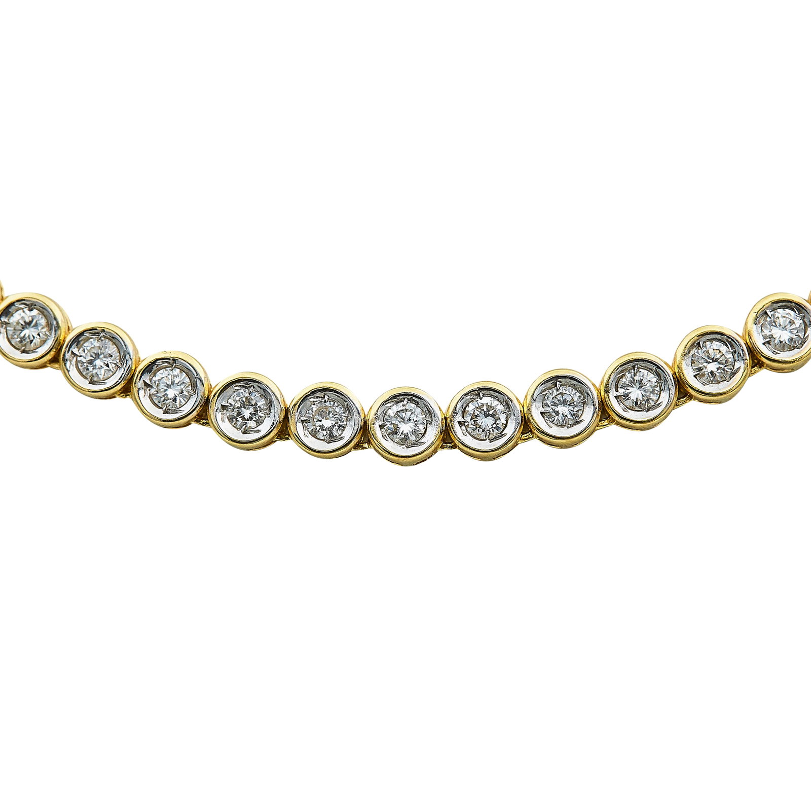 18K Yellow Gold and Diamond Bezel Tennis Link Necklace: METAL: 18K Yellow Gold; APPROXIMATE TOTAL DIAMOND WEIGHT: 5.40 ctw; STAMPED: 750; CONDITION: Pre-owned, Very Good; ITEM WEIGHT (GRAMS): 27.7 g; MEASUREMENTS: Necklace approx. 16 1/2 inches long x 3/16