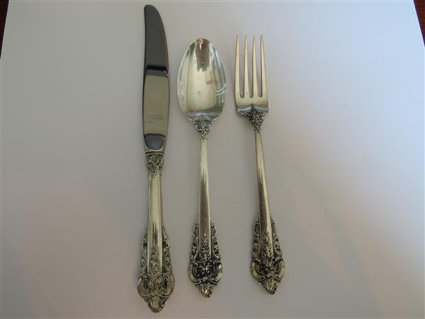 Wallace Grande Baroque Sterling Silver Youth Set of 3: Metal Sterling SilverLength Youth Hollow Handle Knife- 7 3/8" LongYouth Five O'clock Spoon- 5 3/4"Youth Fork- 5 7/8"Condition Pre-owned / Excellent. All Silver Is In Original Condit