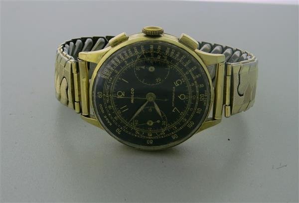 Vintage Mulco Manual Wind Watch: MulcoSeconds @ 9 o'clockManual Wind movementPush pull crownDial: Black Acrylic CrystalSteel BraceletGender/Size: Mens Round Case: 35 mm in diameterNo Box / No Papers Guaranteed Authentic