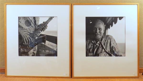 Dexter Gordon Photograph Lot of 2: Two black and white photographs featuring Dexter Gordon with his trademark tenor saxophone--28 x 25 in.--framed. (2)