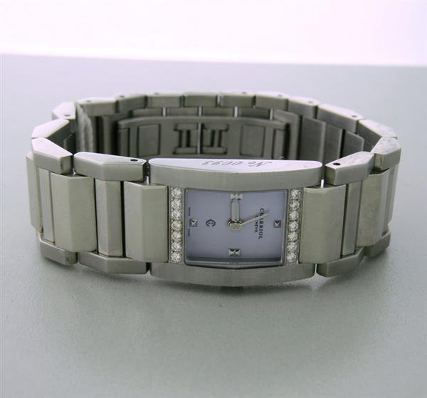 Charriol Diamond Ladies Watch Bracelet: steel case 28mm X 19mm, set with diamonds, mop dial, steel bracelet.