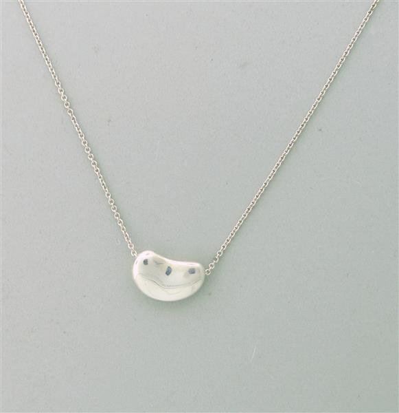 Signed Tiffany & Co Peretti Bean Pendant Necklace: Chain is 18" long. Pendant is 20.2mm x 12mm. Marked - Tiffany & Co,Elsa Peretti,925.