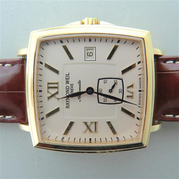Raymond Weil Automatic Mens Wrist Watch: 27 jewel automatic movement. Set in rectangular gold electroplated screw down case with skeleton back. Original Breguet alligator band,original Raymond Weil buckle.
