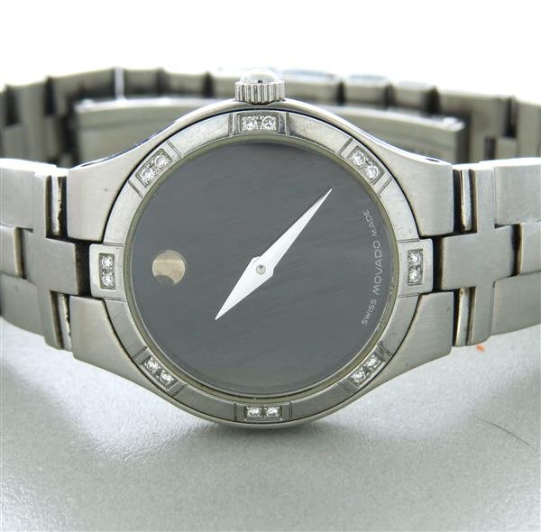 Movado Stainless Steel Diamond Ladies Watch: Case is 24mm in diameter. quartz movement,full length bracelet.