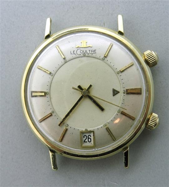 Vintage 14k Gold LeCoultre Alarm Watch: 34mm in diameter. 41mm lug to lug tip. Date window at 6 o 'clock. center second hand. case marked - 14k gold,use all proof 1260 wrench.