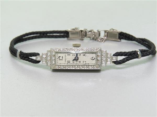 Croton Platinum Diamond Ladies Watch: Bracelet is 7" long, case 36mm x 10mm without crown.