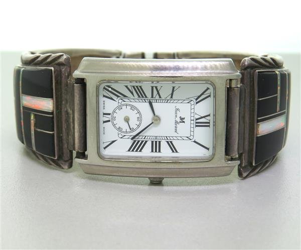 Jean Marcel Onyx Opal Inalay Sterling Watch: stainless steel case 27mm x 29mm without lugs. Sterling silver bracelet is 7" long. weight - 78.9g