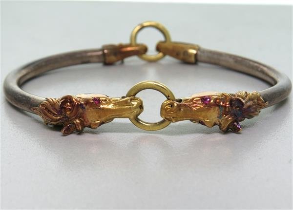 Vintage 14k Gold Sterling Ruby Bangle Bracelet: Bracelet will fit up to 6 1/2" wrist and is 8.5mm at widest point. Ruby eyes. weight - 31.4g