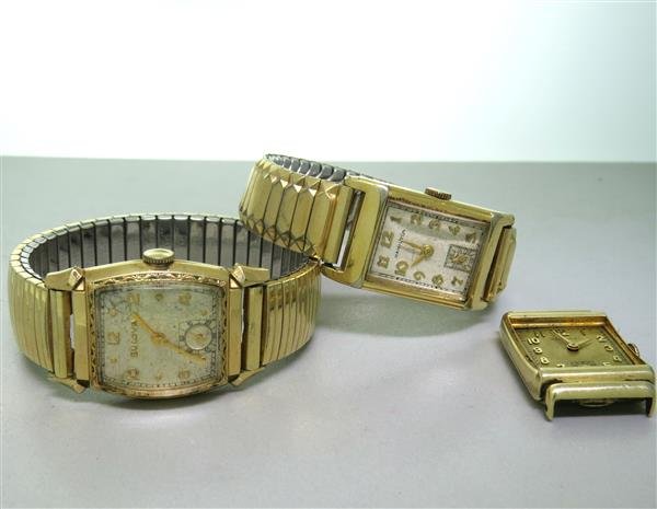 Bulova Hamilton 10k 14k Gold Filled Watch Lot of 3: Bulova - 10k gold filled and steel case 25mm x 27mm excl. lug tips. manual wind movement. Hamilton - both watches are 14k gold filled, cases are 22mm x 34mm on watch without bracelet. With bracelet -