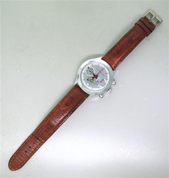 Russian Military Chronograph Watch Bracelet: Case - 38mm without crown x 38mm without lugs. Date at 6 o'clock. Hamilton leather band.