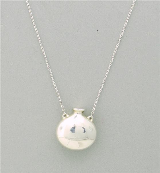 Tiffany & Co. Peretti Silver Round Bottle Pendant: Necklace is 18" Long, Bottle measures 19.5mm x 20mm, Marked - Tiffany & Co. @Elsa Peretti, 925, Spain, Weight - 5.8g