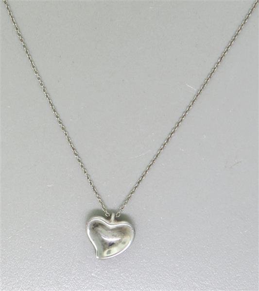 Tiffany & Co. Peretti Silver Heart Pendant Necklace: Necklace is 16.5" long, heart pendant measures 13mm x 13.5mm. Marked - Tiffany & Co, Elsa Peretti, 925, Spain, Weight - 4.2g