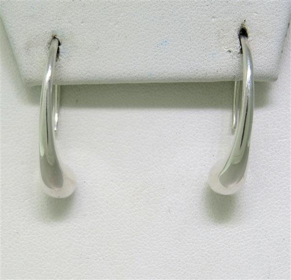 Tiffany & Co. Peretti Silver Teardrop Earrings: Earrings measure 28mm long and 5mm at widest point. Marked - Tiffany & Co, @Elsa Peretti, 925, Spain. Weight - 6.2gRetails for $375