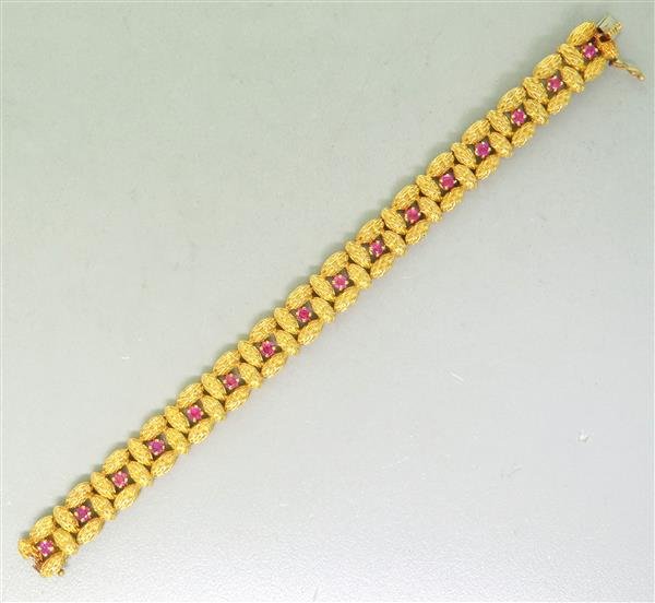 18K Gold Ruby Line Bracelet: Bracelet measures 6.5" long and is 11mm wide. Marked - 18K, Weight - 38.1g