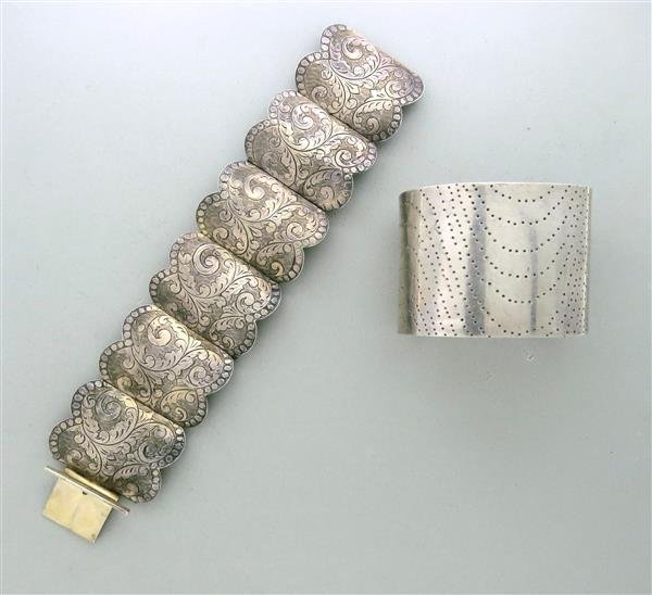 Signed Sterling Silver Bracelets Lot of 2: Cuff Bracelet - Will fit up to 6.5" wrist, 45mm wide. Marked - Mignon Faget Sterling, Weight - 67.3gLine Bracelet - 7" Long, 40mm wide. Marked - SIAM, Sterling. Weight - 68.3g
