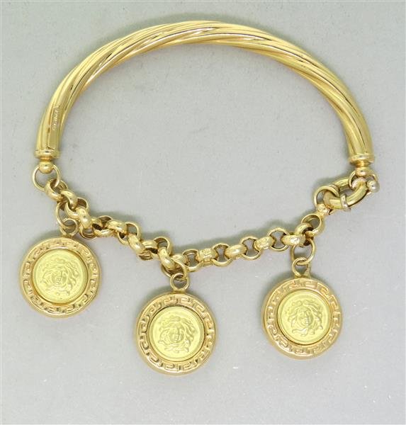 18K Gold Medallion Charm Bracelet: Bracelet will fit 6.5" wrist, medallions are 16.5mm in diameter. Marked - 750, Italy. Weight - 16.2g
