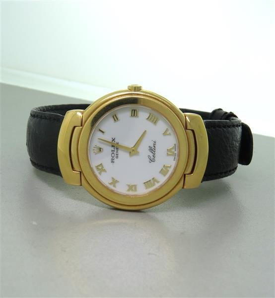 Rolex Cellini 18k Gold Watch ref. 6622: 18k gold case - 33mm excl. crown x 33mm excl. lug tips. Original 18k gold buckle and Rolex leather strap. Ref 6622. Box and papers. quartz movement