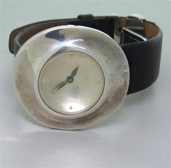 Robert Lee Morris Silver Leather Strap Watch: Case - 39mm x 35mm. Buckle and strap signed Robert Lee Morris.