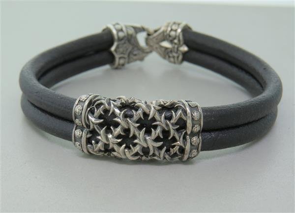 Scott Kay Sterling Leather Bracelet: Bracelet is 8 1/2" long and 16mm at widest point. Marked SK,OS. weight - 39.1g