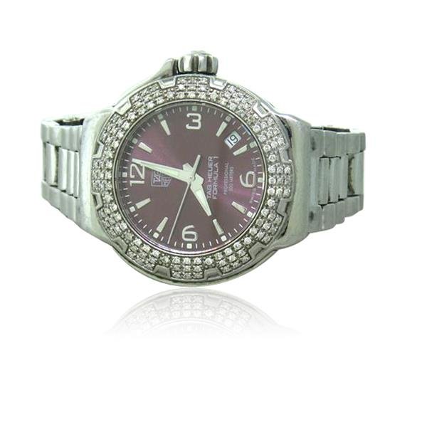 Tag Heuer Formula Diamond Watch WAC1219 0: Case is 34mm in diameter excl. crown and lug tips. Diamond bezel. Date between 4 and 5 o'clock. Quartz movement,running order. Bracelet will fit up to 6" wrist.