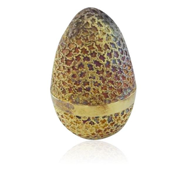 Cartier Stuart Devlin Clown Sterling Silver Vermeil: Egg measures L 2 3/4" Sterling silver egg with gold vermeil, textured exterior. Silver clown inside. Hallmarked #31 Made in England, English Assay Marks, SD. Covered leather box with red interior